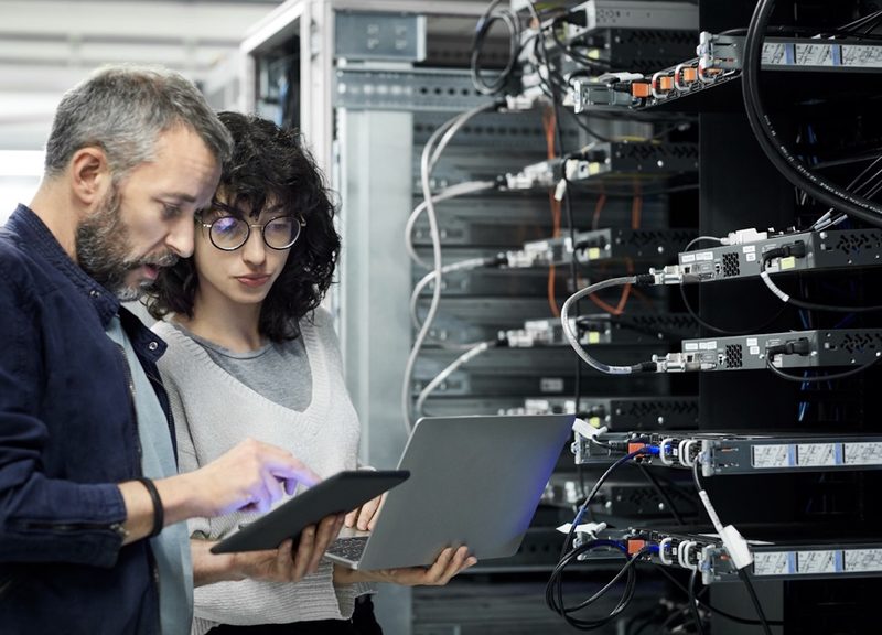 Engineers working in a data center