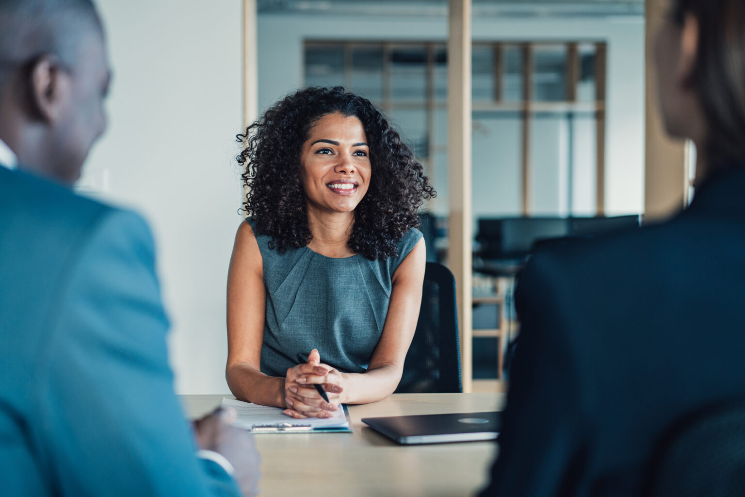 Risk advisory professionals reviewing compliance and cyber-risk priorities
